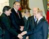 Russian President Vladimir Putin (R) greets Foreign Minister of Costa Rica Roberto Rojas (L), Foreign Minister of Peru Allan Wagner (2ndL) Foreign Minister of Brazil Celso Amorim (3rdL) before negotiations as Russian Foreign Minister Igor Ivanov (2ndR) looks on in Moscow, April 1, 2003. (Reuters)